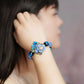 Luxury Blue Colored Jade Flower & Garnet Bracelet