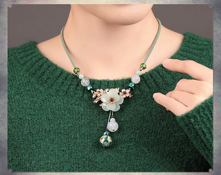 Charming Perfections Elegant Handmade Green Agate Crystal Natural Stone Necklace Jewelry around neck with green sweater and rown background for Gift, Birthday, Anniversary, Wedding, Black Friday, Christmas, Friendship and Holiday