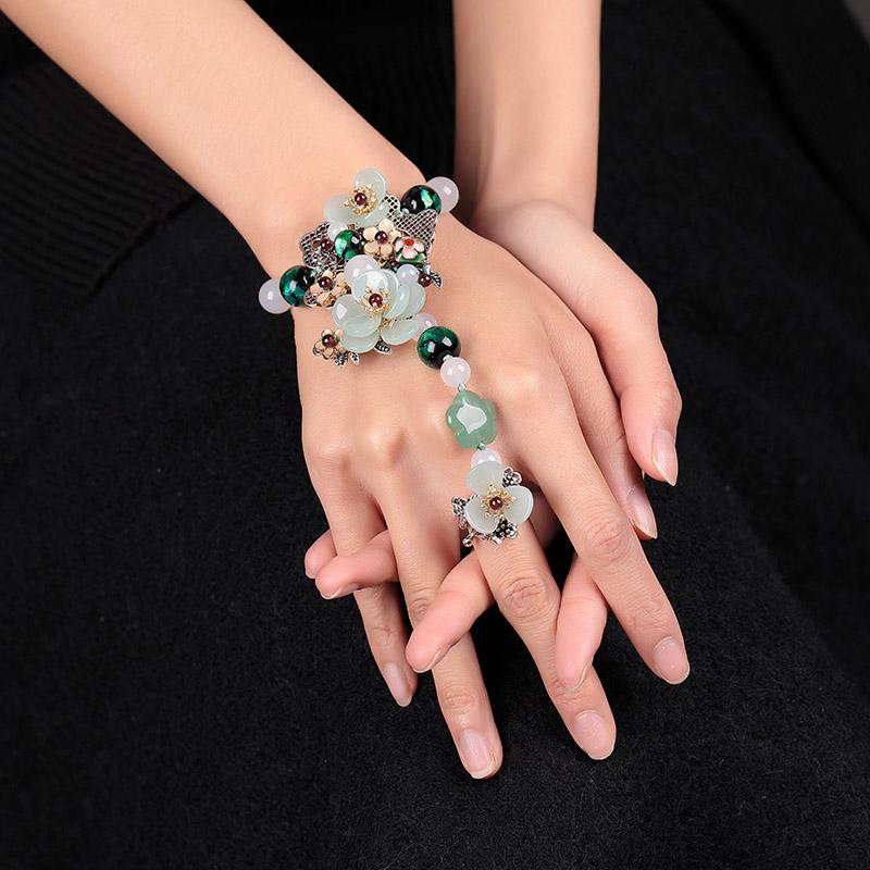 Charming Perfections High Quality Natural Jade Flower with Garnet and Agate Stones Bracelet Ring on wrist Pure Natural Stone Crystal Beauty Jewelry. Perfect for Birthday Gifts, Anniversary, Christmas, or any Occasion. Perfect Present for a Loved one. Fashion and Style. Very Fashionable for that special someone.