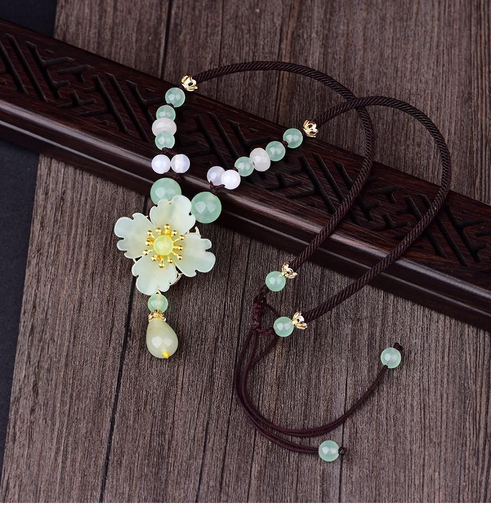 Charming Perfections High Quality Natural Green Jade Flower necklace Jewelry with wooden art background Pure Natural Stone Crystal Beauty Jewelry. Perfect for Birthday Gifts, Anniversary, Black Friday, Christmas, or any Occasion. Perfect Present for a Loved one. Fashion and Style. Very Fashionable for that special someone.