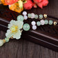 Charming Perfections High Quality Natural Green Jade Flower necklace Jewelry with wooden art background Pure Natural Stone Crystal Beauty Jewelry. Perfect for Birthday Gifts, Anniversary, Black Friday, Christmas, or any Occasion. Perfect Present for a Loved one. Fashion and Style. Very Fashionable for that special someone.