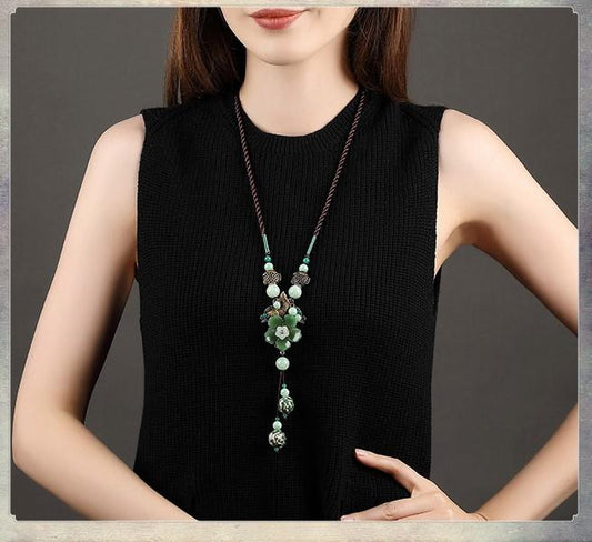 Charming Perfections Beautiful green Jade Crystal Natural Stone brown rope Necklace Jewelry around neck with gray background for Gift, Birthday, Anniversary, Wedding, Christmas Friendship and Holiday